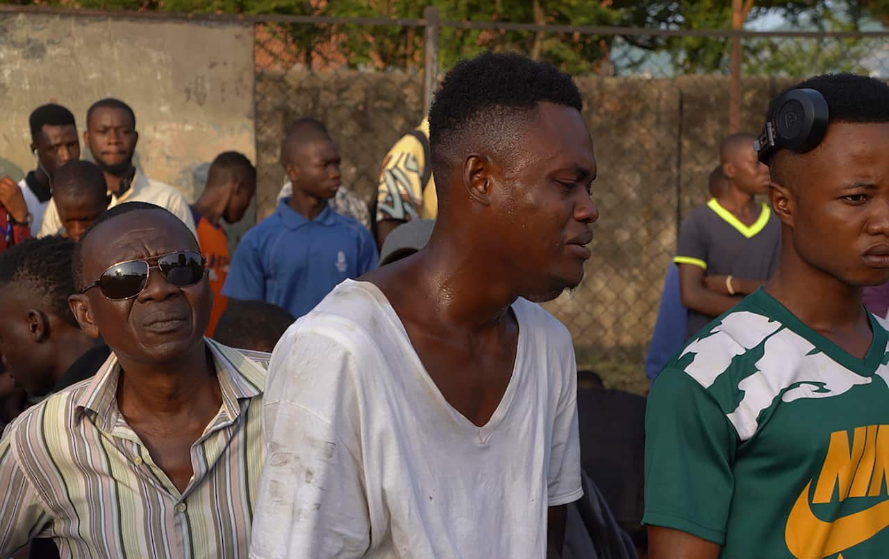 Sierra Leone residents of Freetown react after the explosion