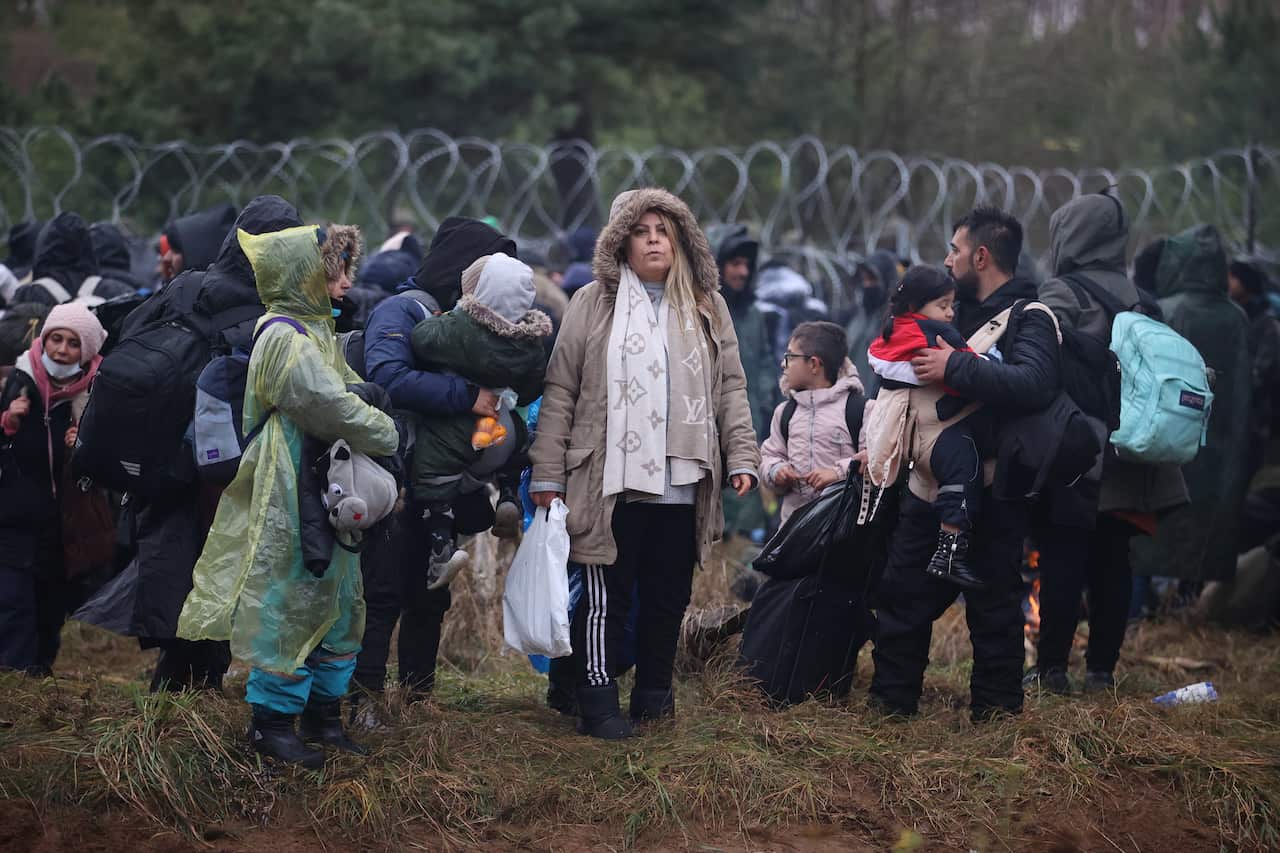 Migrants gathering on the Belarus-Poland border in the Grodno region, Belarus, 8 November 2021.