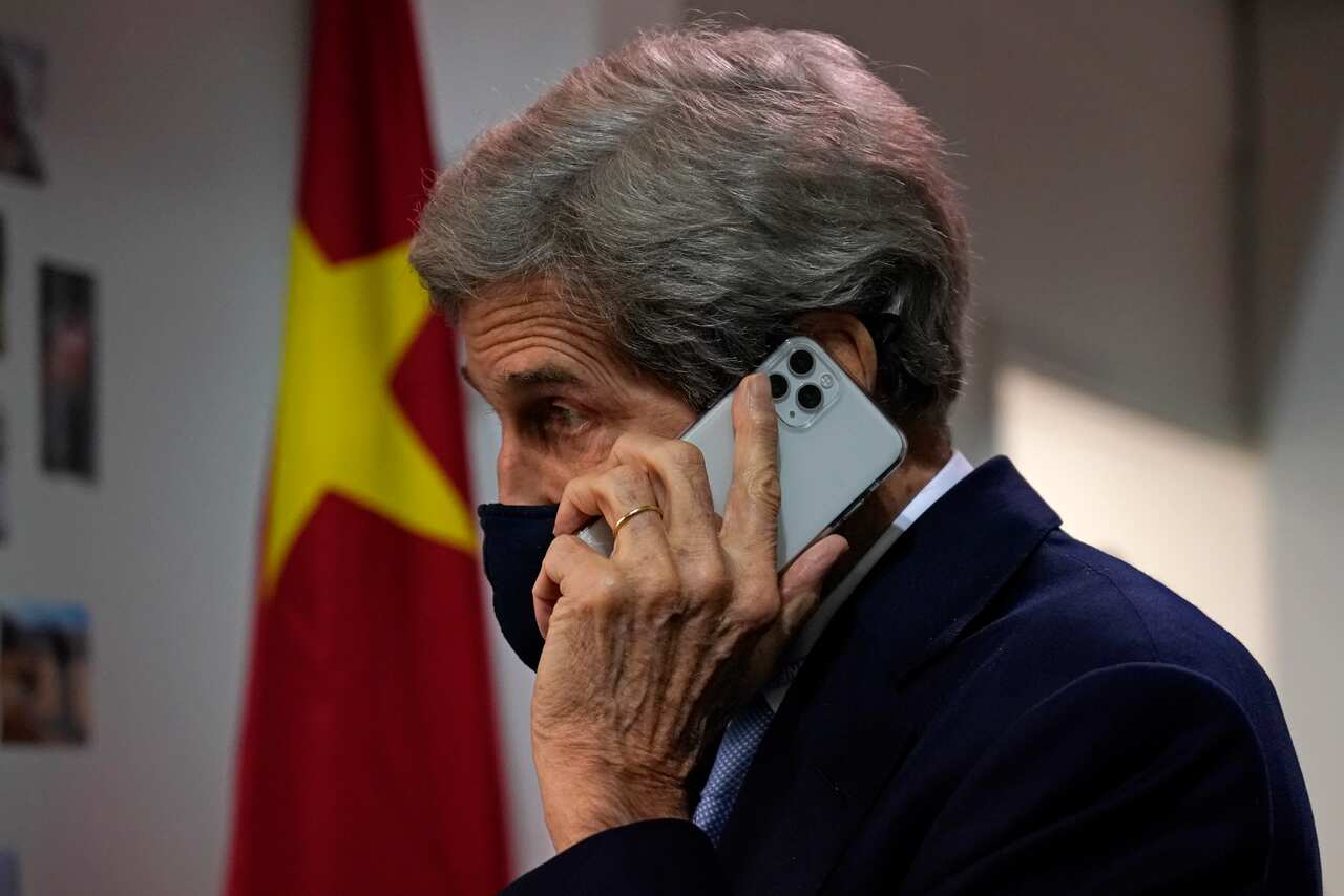 John Kerry, United States Special Presidential Envoy for Climate speaks on the phone at the COP26 UN Climate Summit Friday, 12 November, 2021.