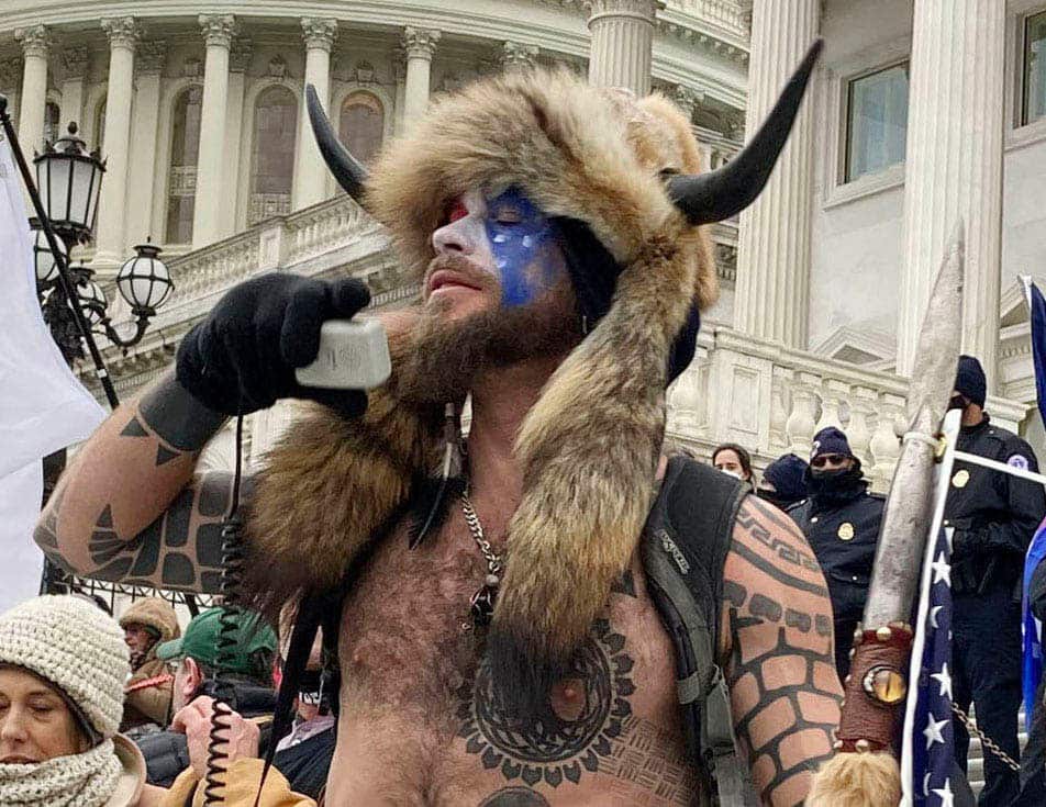 Jacob Chansley is being sentenced for obstructing an official proceeding inside the Capitol in Washington on January 6.