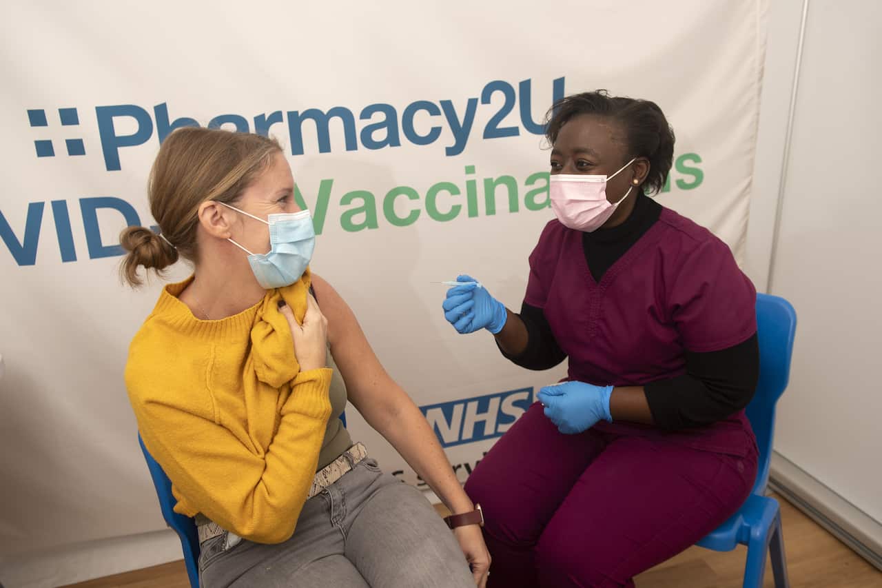 About 350,000 booster jabs a day are being administered across the UK.