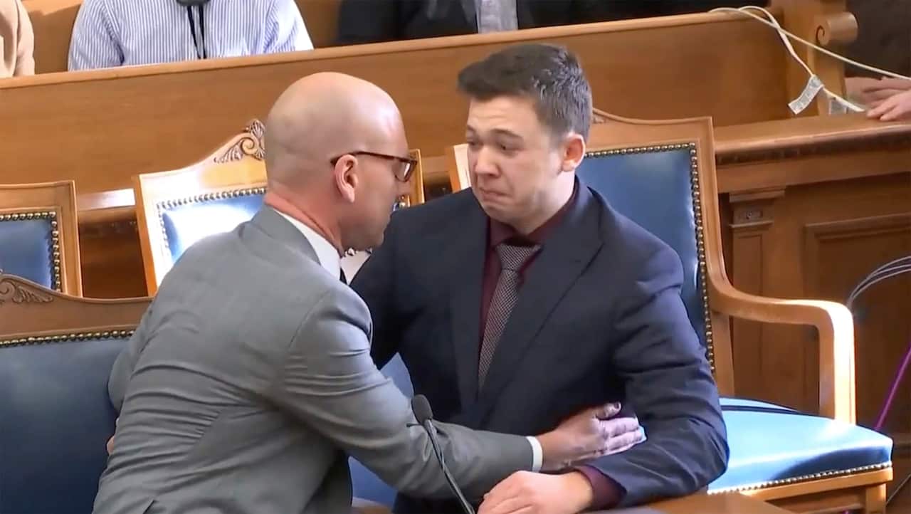 Kyle Rittenhouse is comforted by his lawyer as he is acquitted of all charges at the Kenosha County Courthouse in Kenosha, Wisconsin.