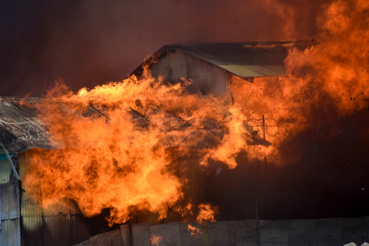 A building burns in Chinatown, Honiara