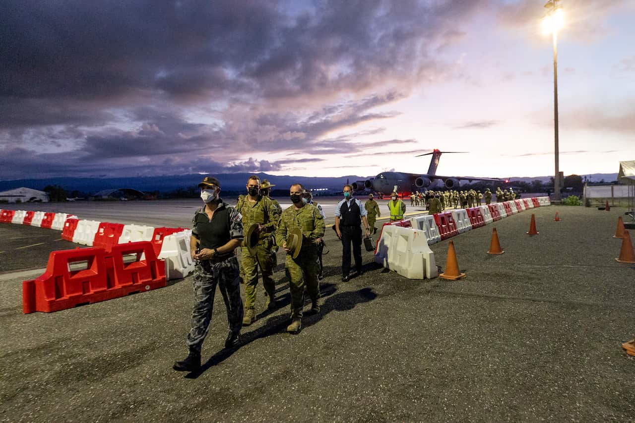 Australian Defence Force members at Honiara Airport on 26 November 2021