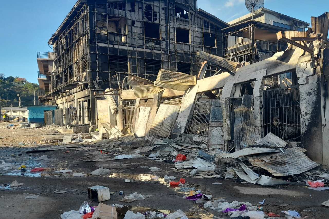 The aftermath of a looted street in Honiara's Chinatown