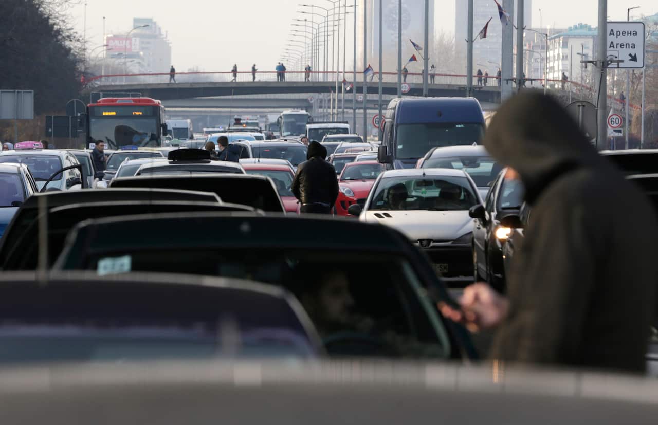 Protesters block the E-75 highway in Belgrade, Serbia, 4 December 2021.