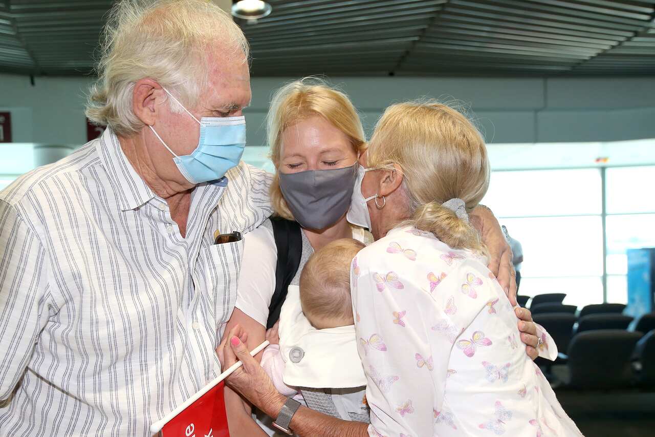 Alexandra Harg and baby Hazel arrive from Sydney to be reunited with Hazel's Grandparents Rob and Maja Fyfe at Brisbane Domestic Airport, Brisbane.