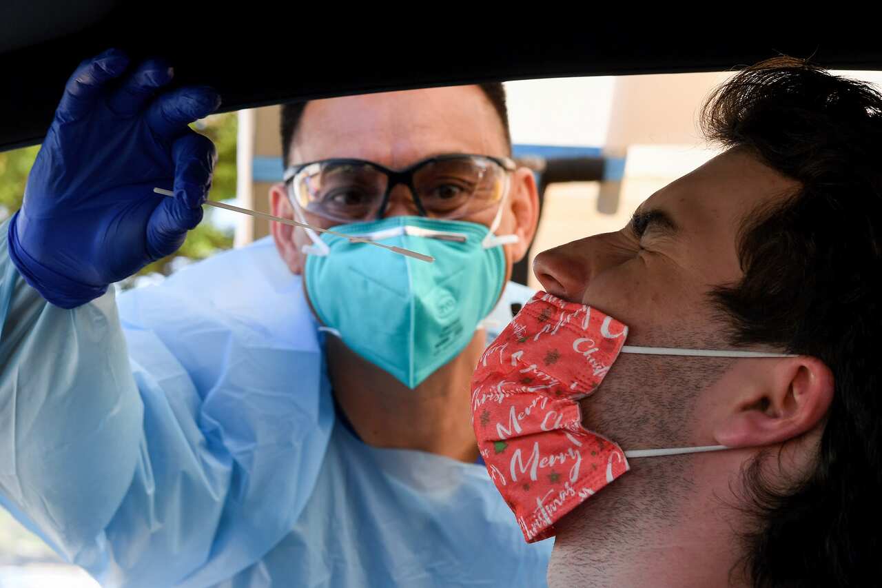 More than 20,000 positive cases in Australia will likely spend Christmas in isolation.