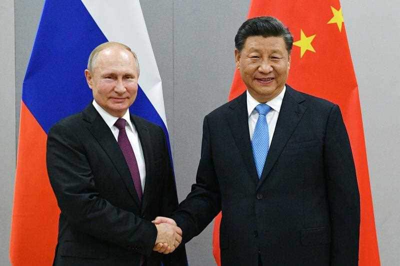A file photo of Putin and Xi from 2019