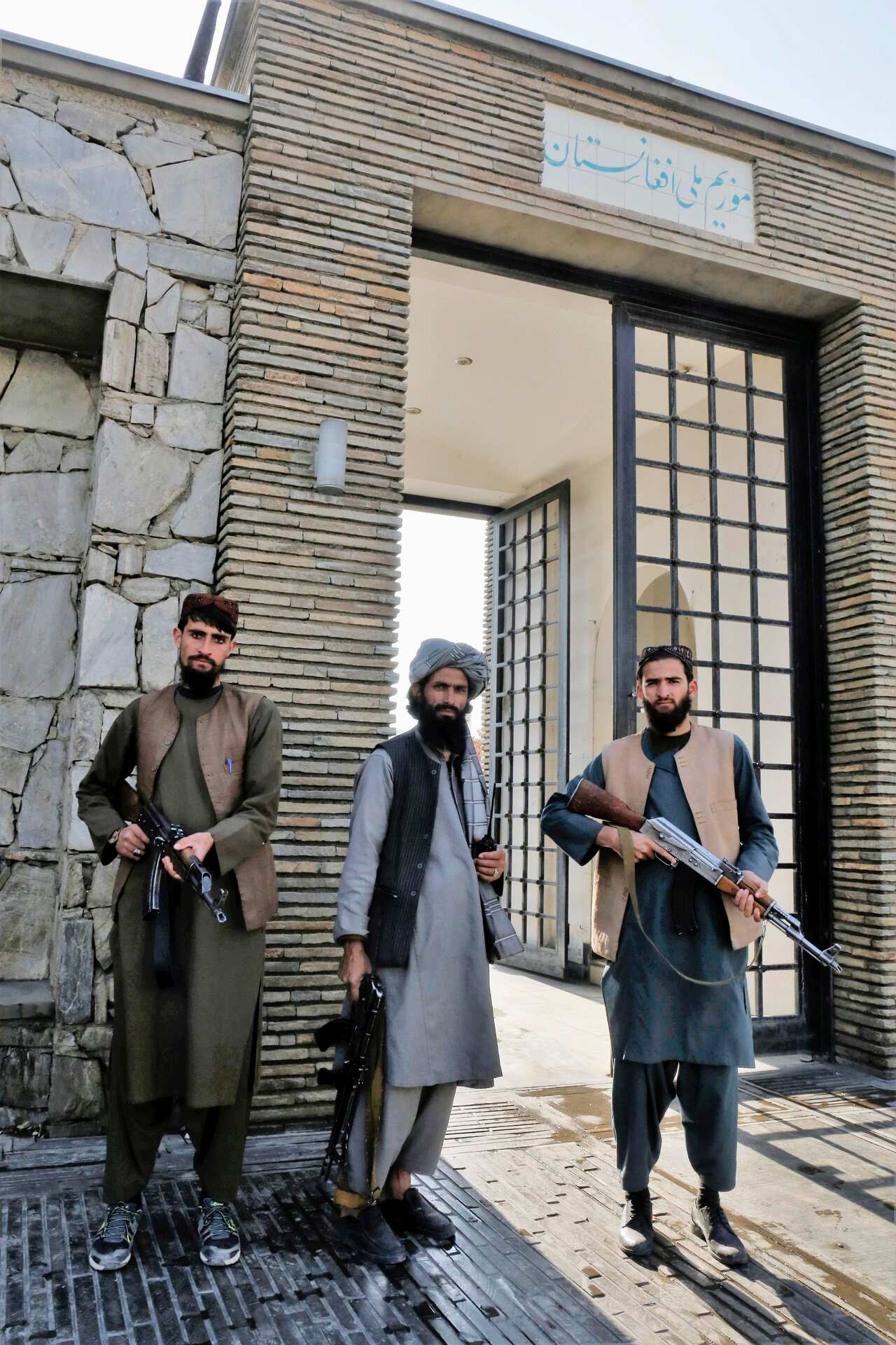 Taliban soldiers stand guard in front of a national museum in the Afghan capital of Kabul.