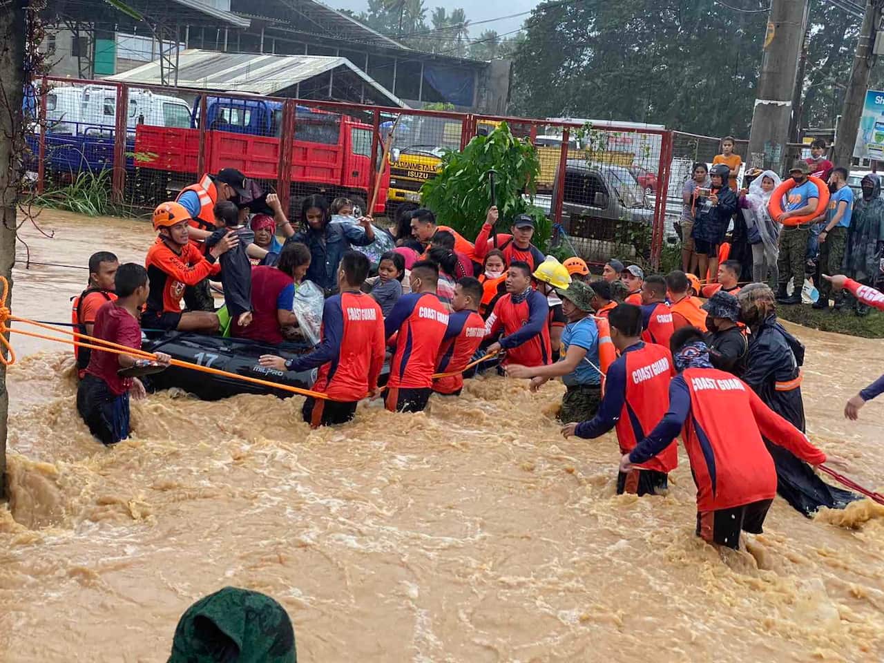 A rescue mission is carried out in the typhoon-hit city of Cagayan de Oro in the southern Philippines.