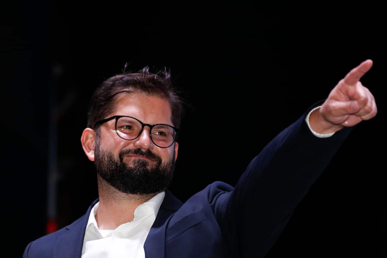 Chile's President-elect Gabriel Boric celebrates his victory in the presidential run-off election in Santiago, Chile.