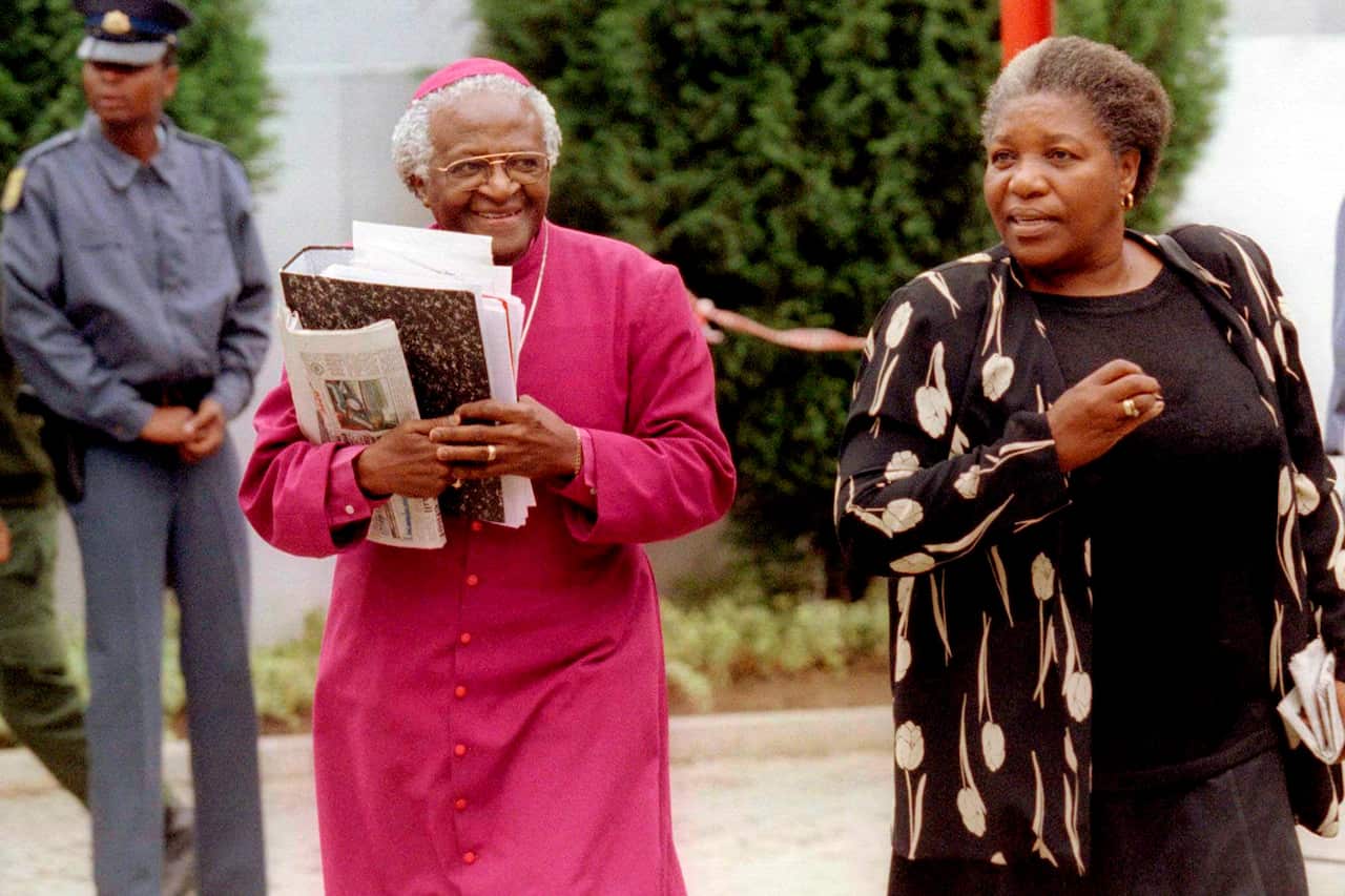 Desmond Tutu and his wife Leah arrive at a special public hearing of South Africa's Truth and Reconciliation Commission in Johannesburg, November 27, 1997. 