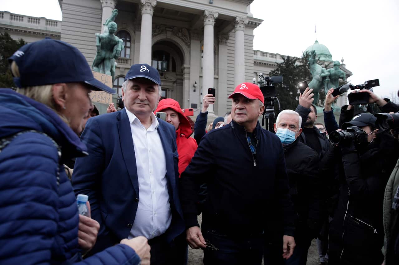 Serbian tennis player Novak Djokovic's father Srdjan (C-R) and mother Diana (L) arrive for a protest of support for their son in Belgrade, Serbia, 06 January 2022. Djokovic's father Srdjan Djokovic said he was the victim of a 'political agenda' in Austral