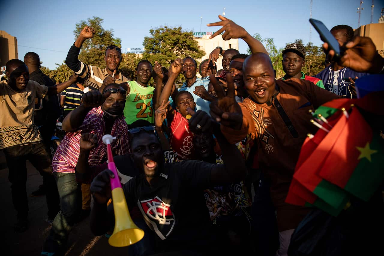A crowd gathered Place de la Nation celebrate at the announcement that Lt. Col. Paul Henri Sandaogo Damiba has taken the reins of the country