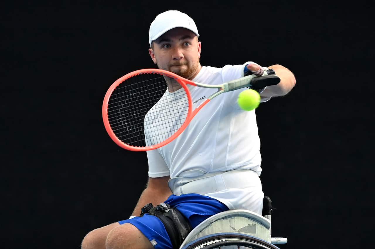 Sam Schroder of The Netherlands plays a shot during his Mens quad wheelchair singles final against Dylan Alcott of Australia on Day 11 of the Australian Open, at Melbourne Park, in Melbourne, Thursday, January 27, 2022. (AAP Image/Joel Carrett) NO ARCHIVI