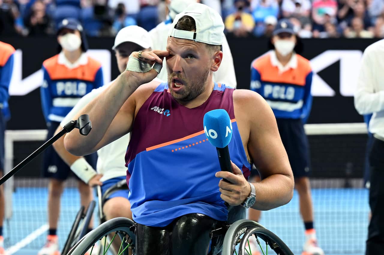 Dylan Alcott of Australia speaks during the presentation following his loss in the Mens quad wheelchair singles final to Sam Schroder of The Netherlands on Day 11 of the Australian Open, at Melbourne Park, in Melbourne, Thursday, January 27, 2022. (AAP Im