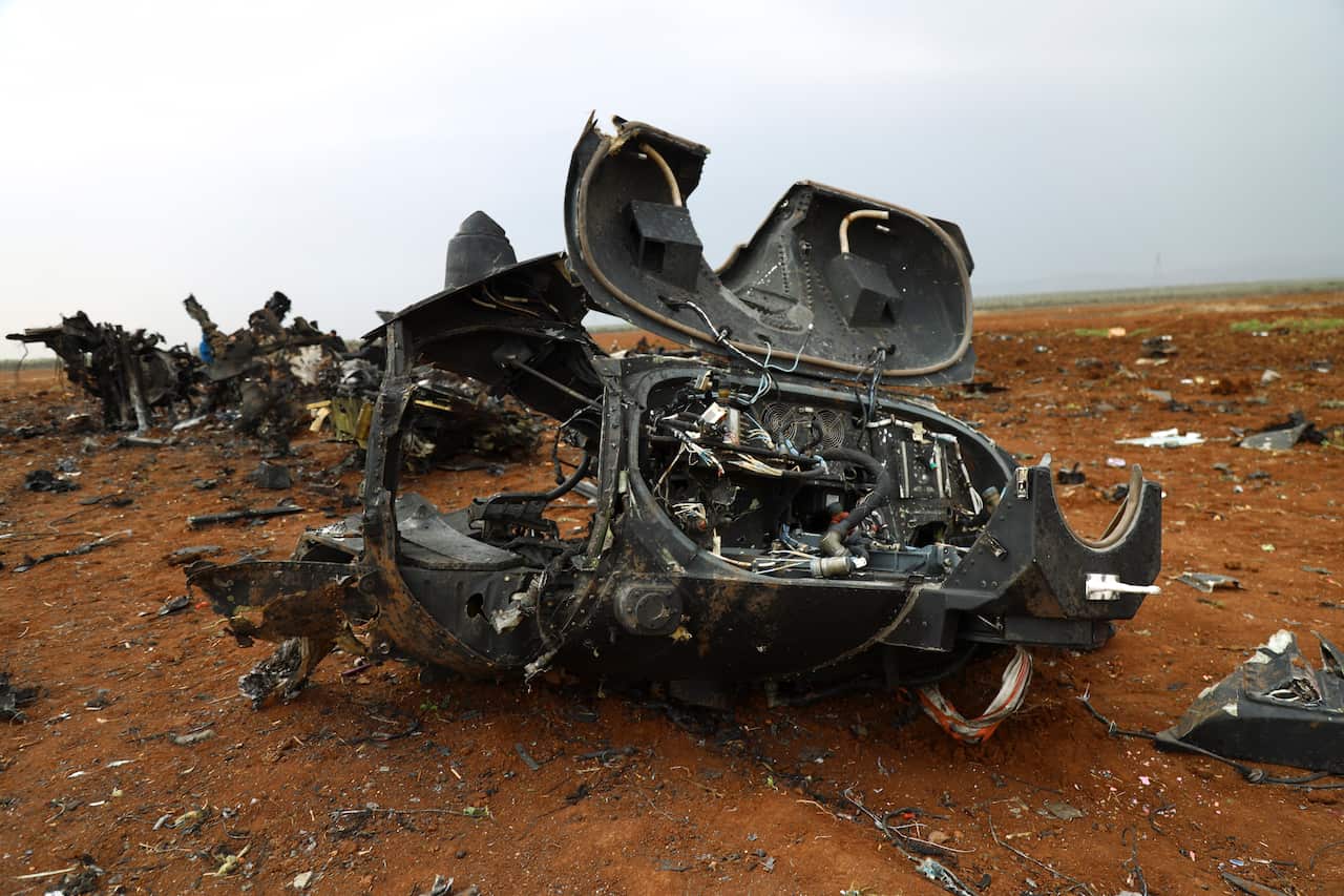 A wreckage of an American helicopter is seen in Afrin region , Syria