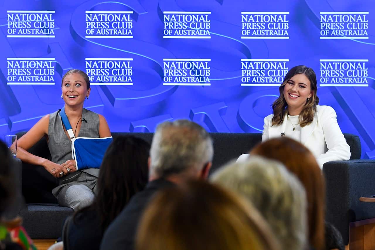 2021 Australian of the Year Grace Tame (left) and advocate for survivors of sexual assault Brittany Higgins address the National Press Club in Canberra, Wednesday, February 9, 2022. (AAP Image/Lukas Coch) NO ARCHIVING