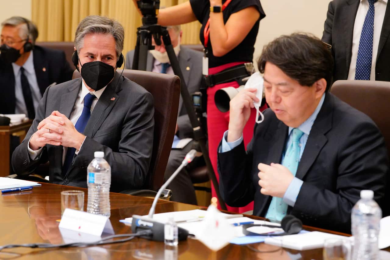 US Secretary of State Antony Blinken listens as Japanese Foreign Minister Yoshimasa Hayashi makes opening remarks during a meeting of the Quadrilateral Security Dialogue (Quad) foreign ministers in Melbourne, Friday, February 11, 2022. The 2022 Quad Forei