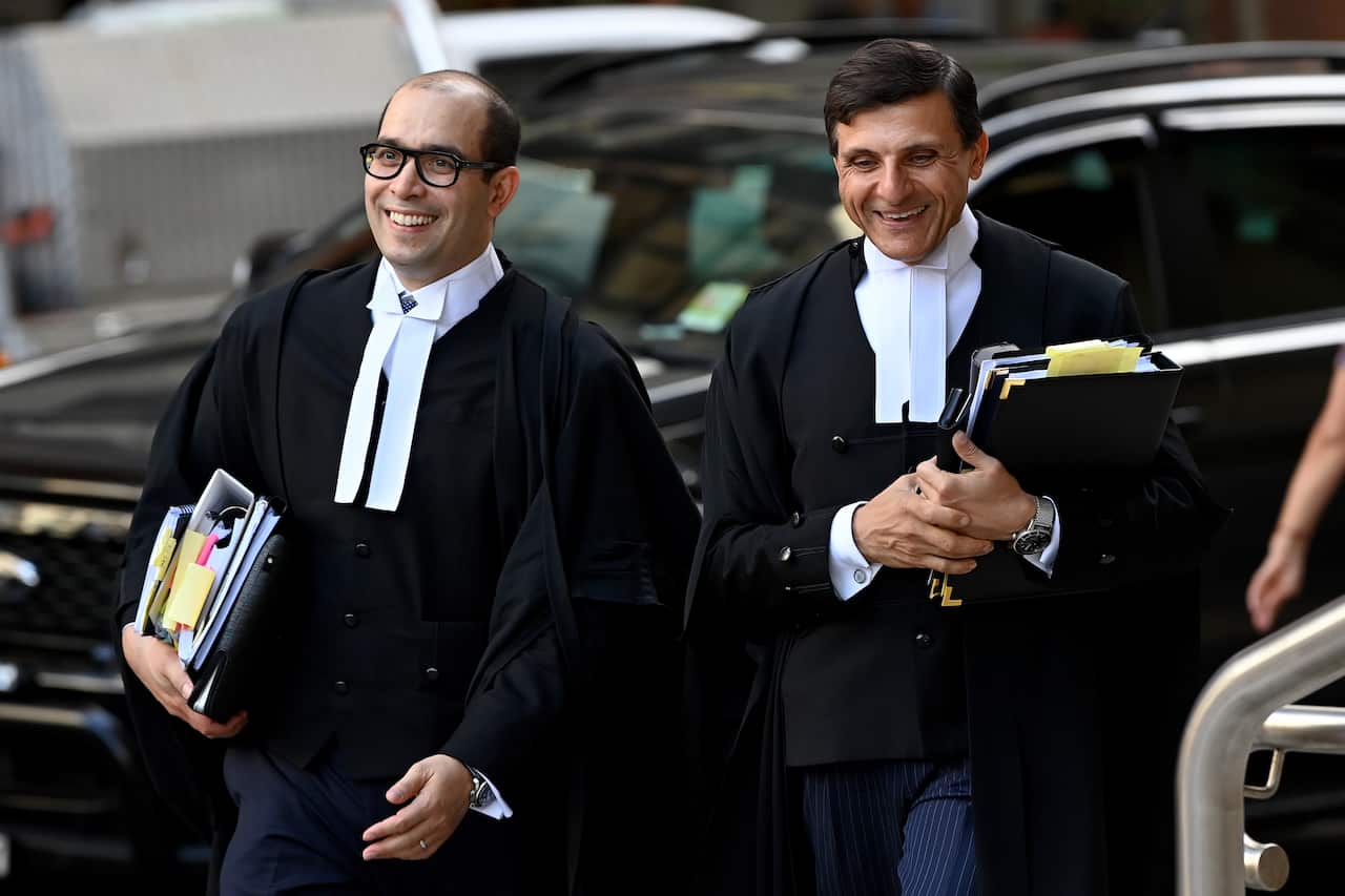 Arthur Moses (right), barrister for Ben Roberts-Smith, arrives at the Federal Court in Sydney, Wednesday, February 16, 2022. 