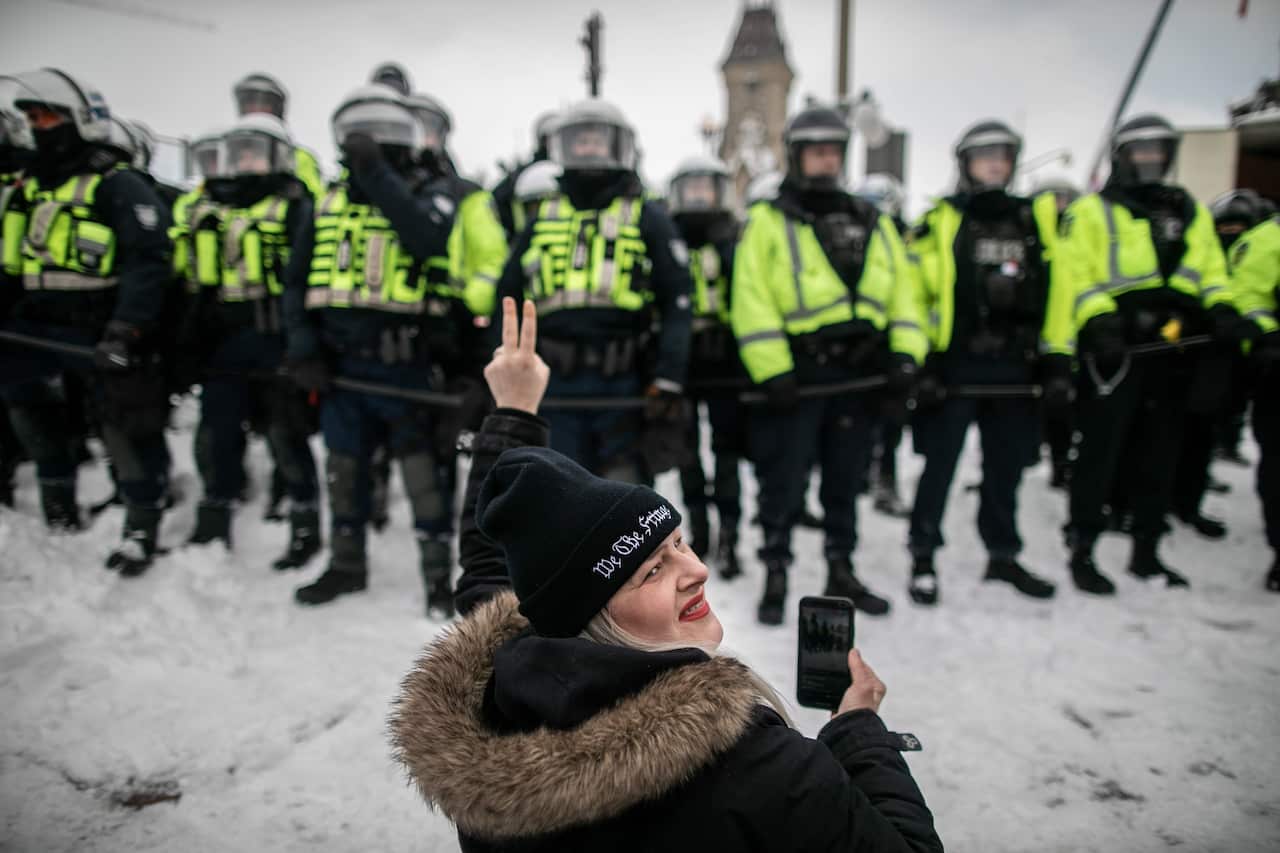 Police forces faceoff with protesters in Ottawa city centre