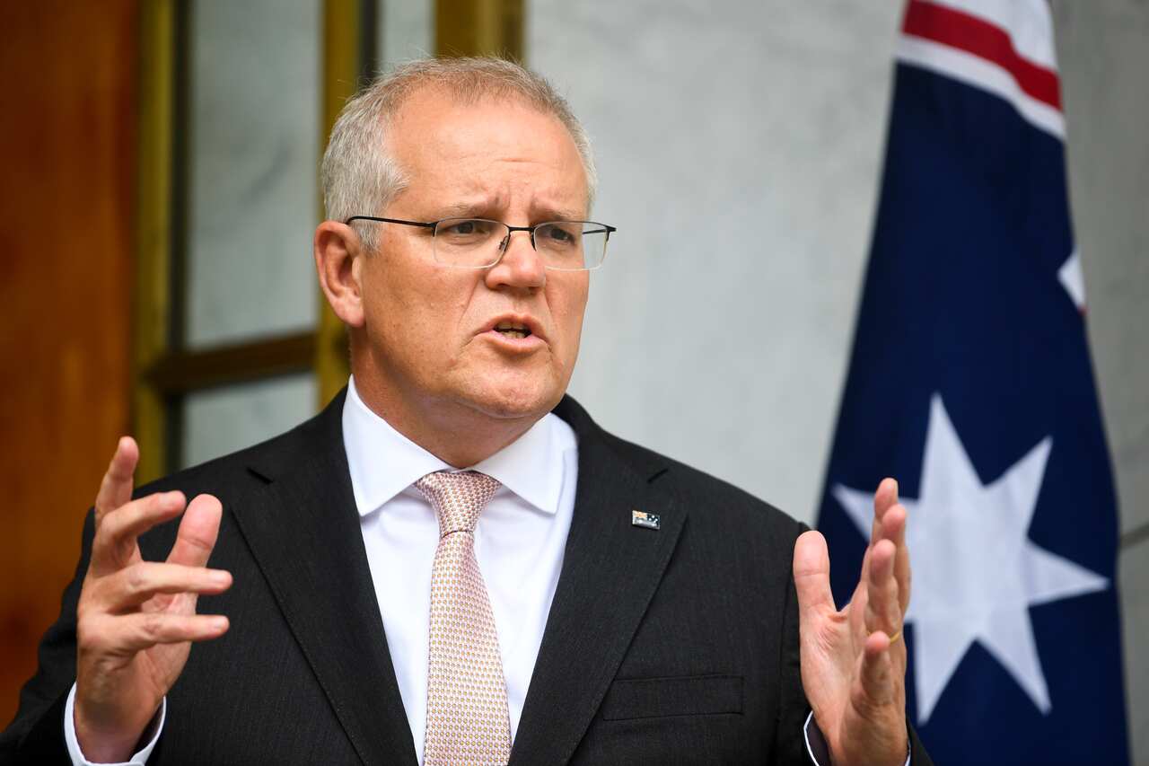 Australian Prime Minister Scott Morrison speaks to the media during a press conference following a national cabinet meeting, at Parliament House in Canberra, Thursday, January 13, 2022. (AAP Image/Lukas Coch) NO ARCHIVING