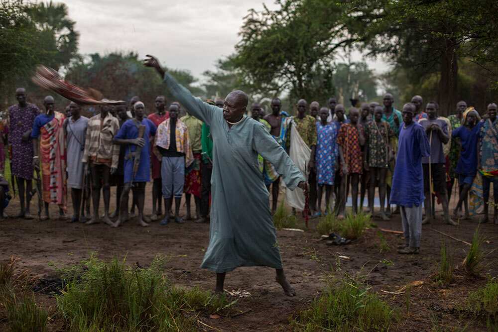 The tribal leader performs a goat sacrifice in an attempt to stop cattle raiding and revenge attacks. As wedding dowries increase, clans are forced to steal each others' livestock, and if necessary, kill whoever stands in their way. (Matthew Abbott)