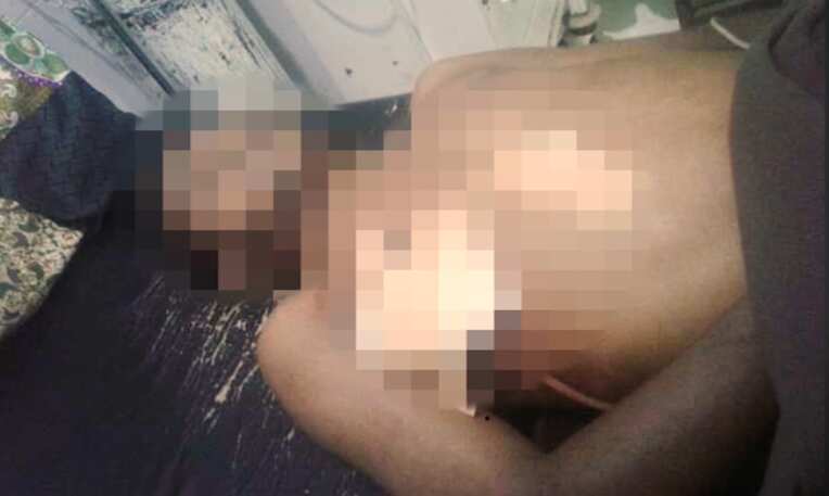 An image allegedly showing the body of 21-year-old Maikel Karet.