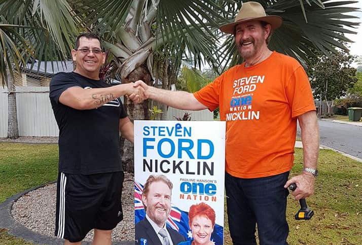 Steven Ford, right, with a supporter.