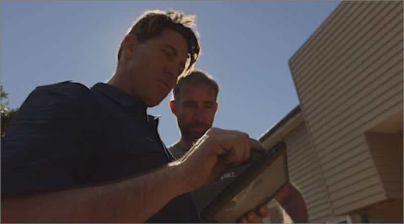 David and Chad go through their work schedule and jobs backed up in the cloud. (Supplied.)