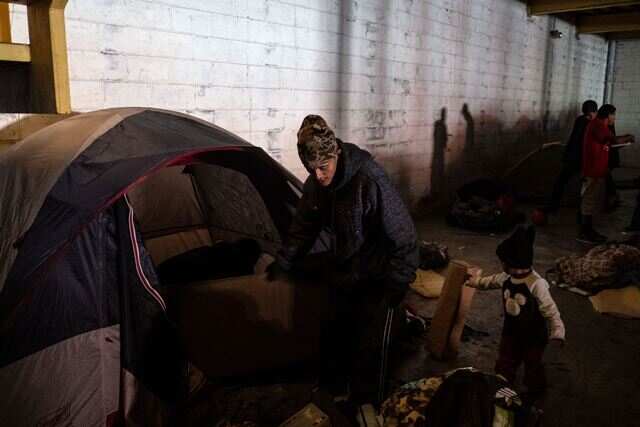 Central American migrants traveling to the United States staying at a shelter in downtown Tijuana