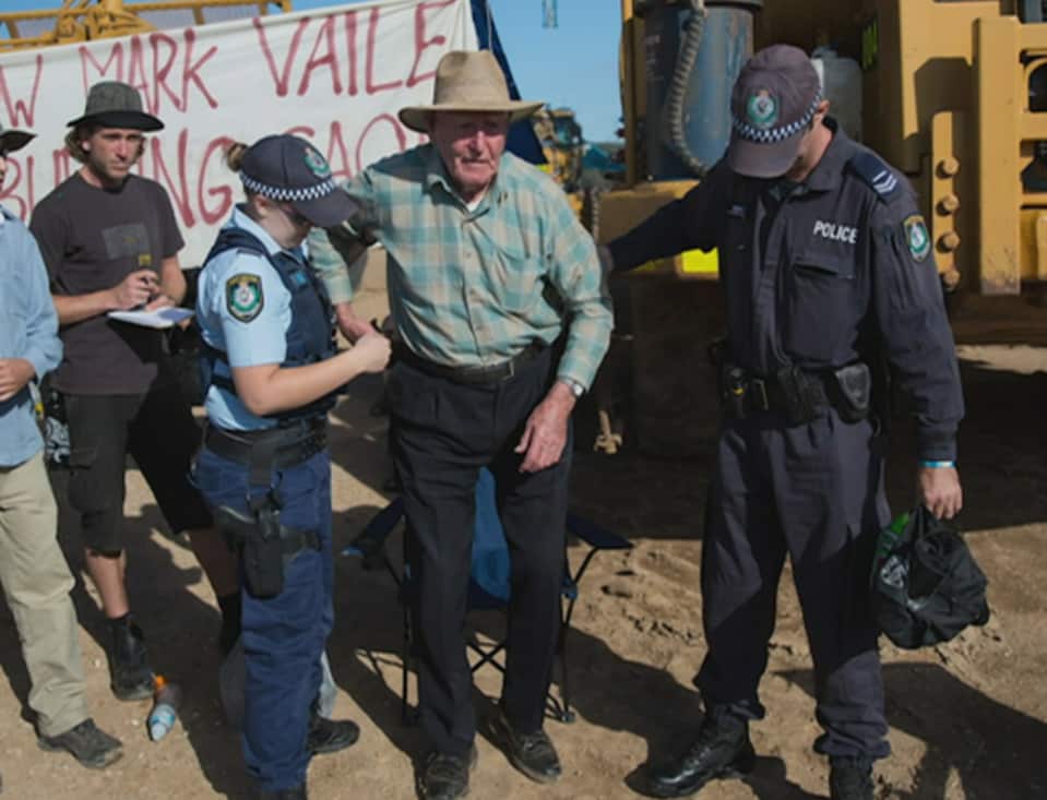 Bill Ryan is arrested at an environmental protest