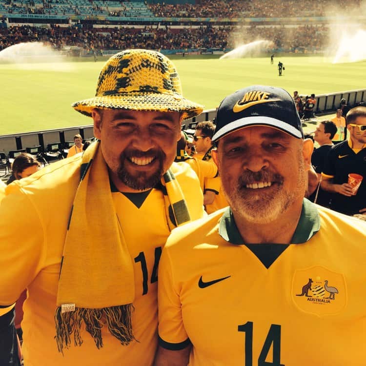 Joe (left) and his husband at the 2014 World Cup in Brazil