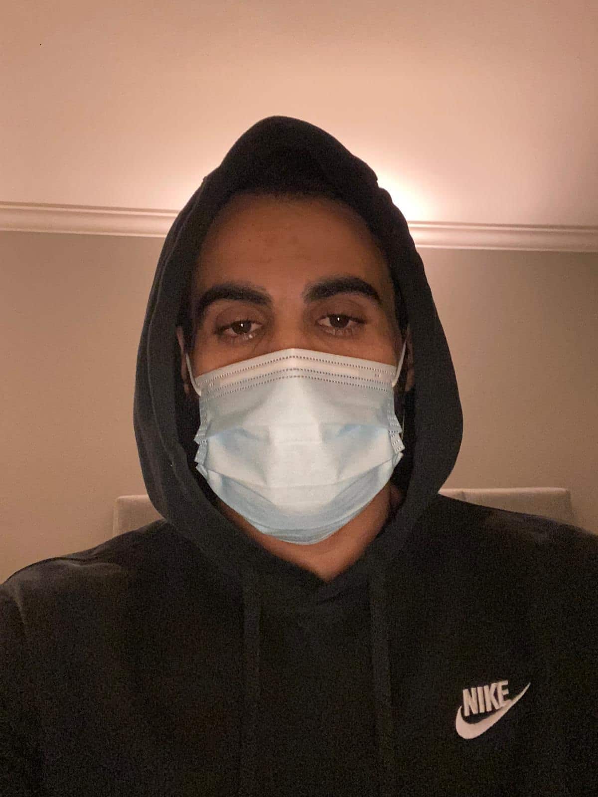 Hossein Latifi wearing a face mask.