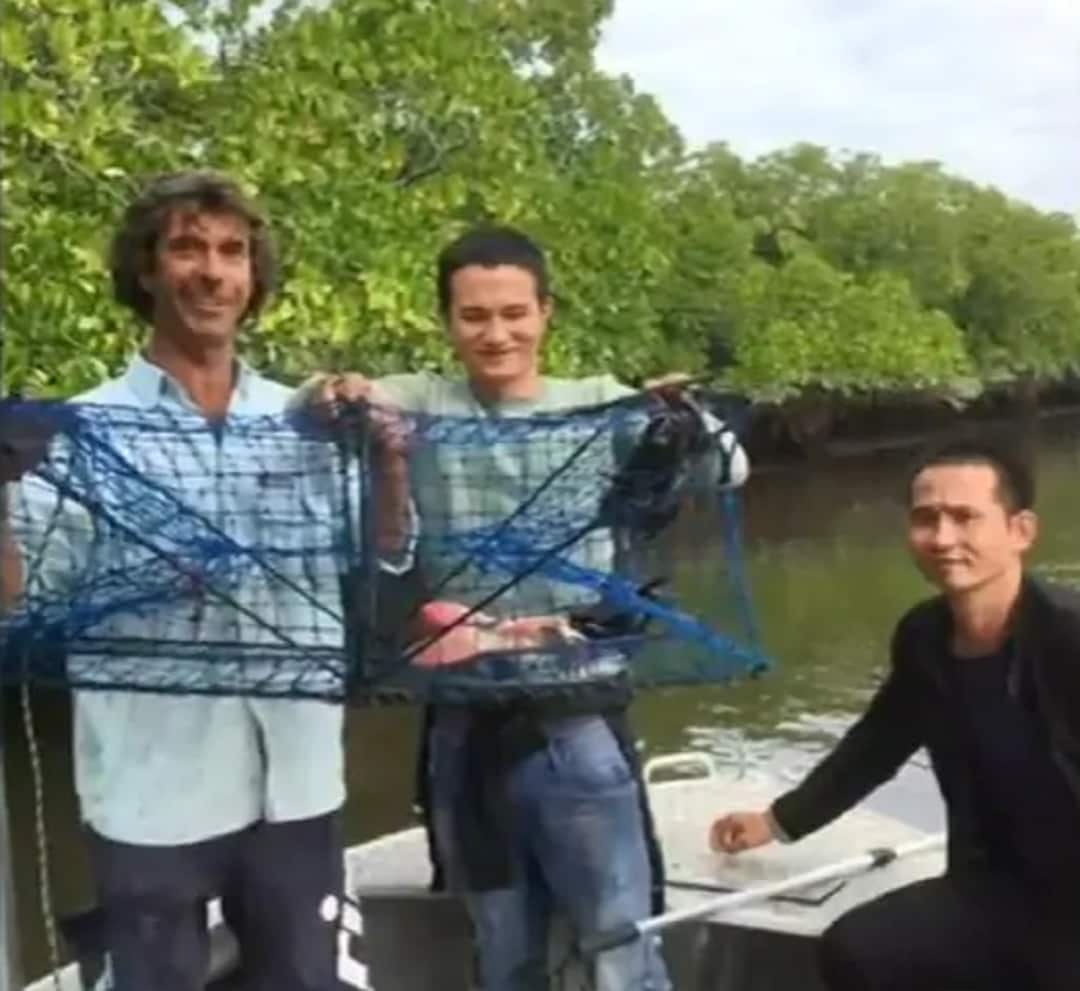 The group brings in some crab pots.