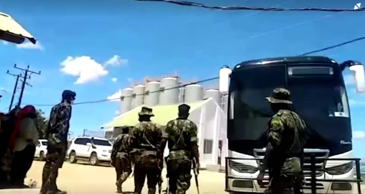 A bus carrying survivors of the attack arriving in Pemba, Mozambique.