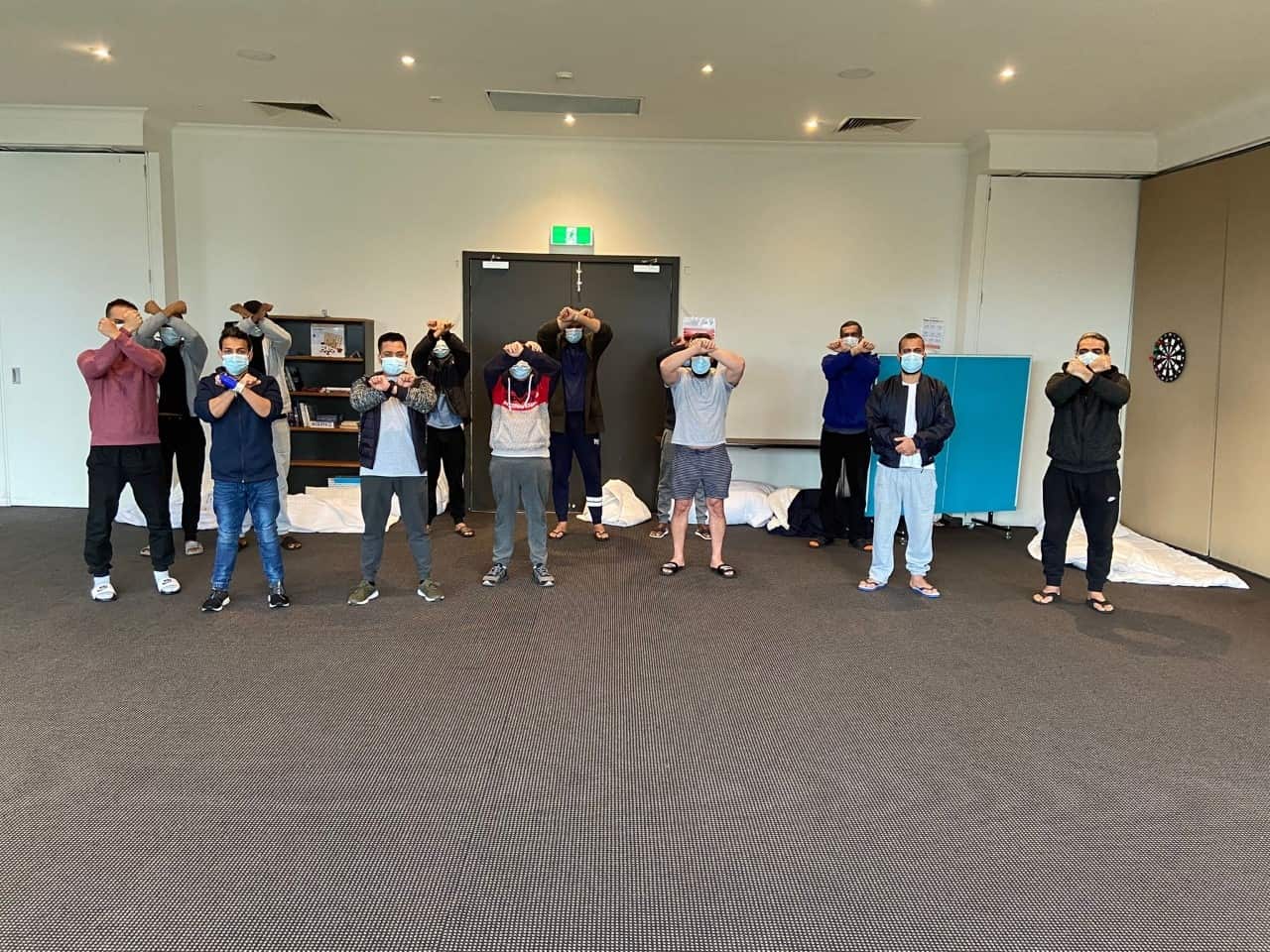 Asylum seekers and refugees protesting their conditions at the Park Hotel in Melbourne. 