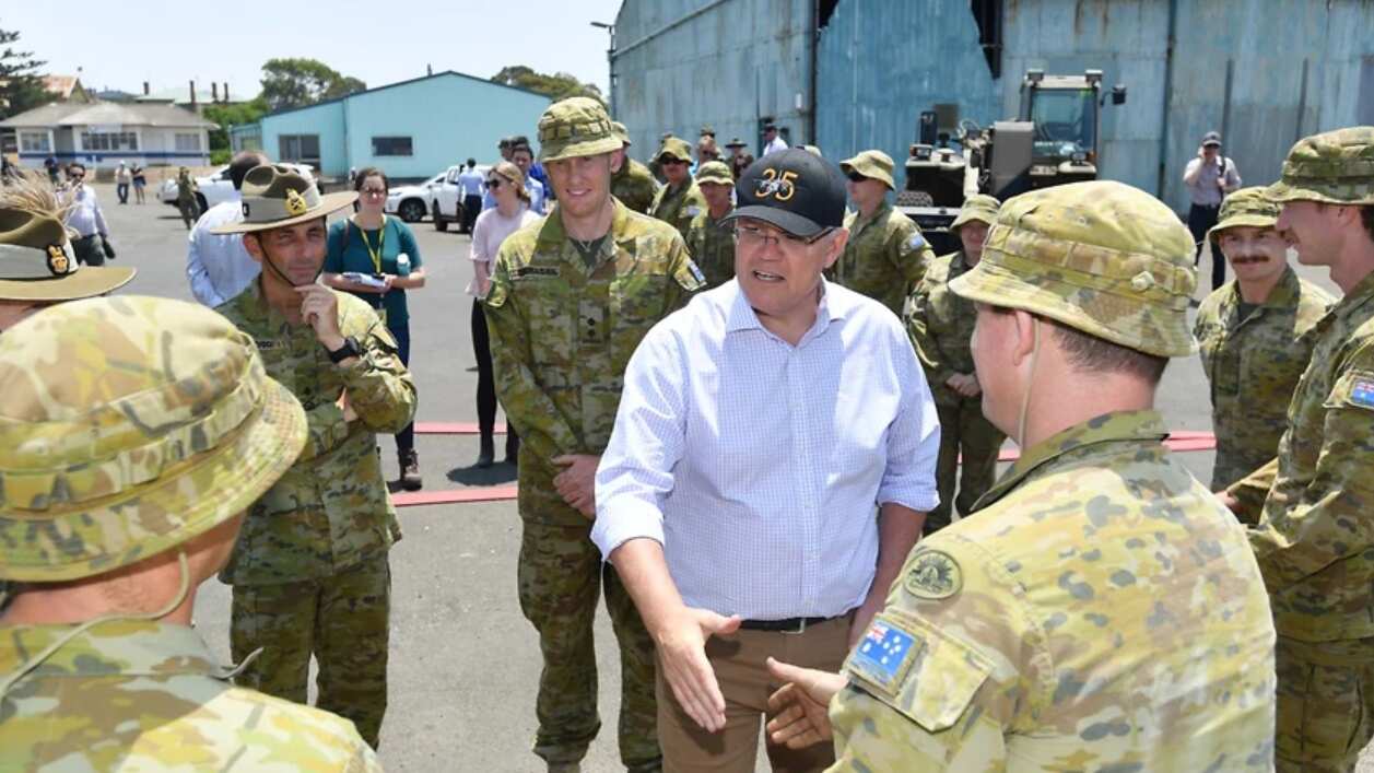 Prime Minister Scott Morrison is seen visiting an army water purification station at Kingscote Jetty on Kangaroo Island.