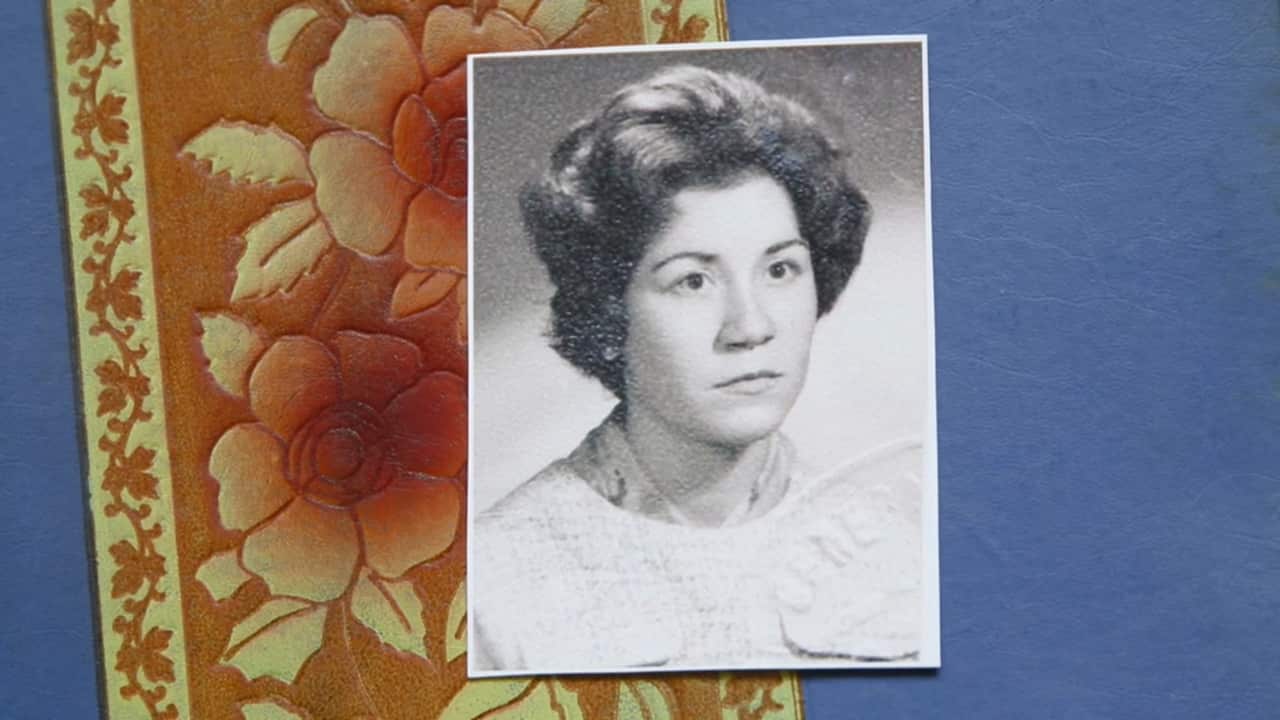 Mari Paz's passport photo, taken in 1960 before she boarded a one-way flight to Australia.