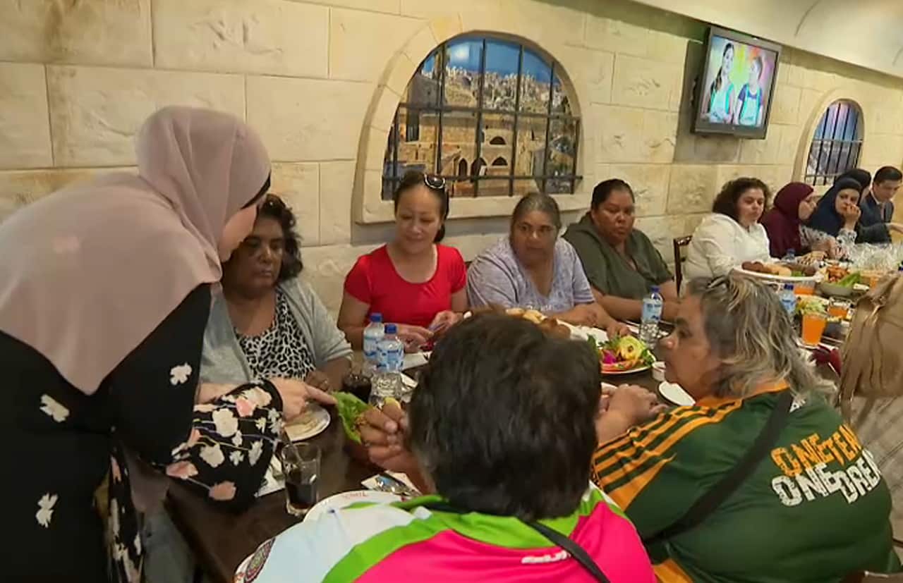 The group shares a meal.