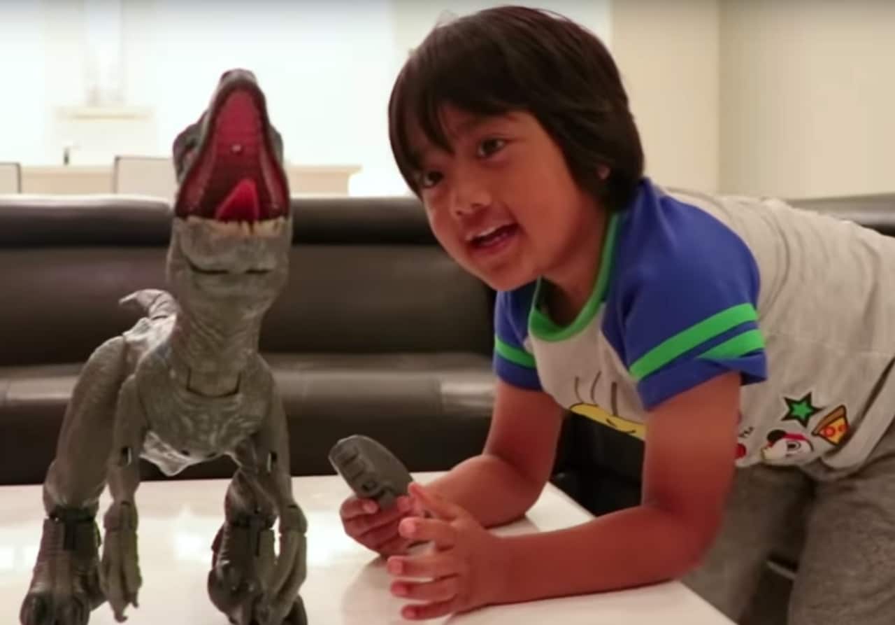 Ryan reviews a dinosaur toy.