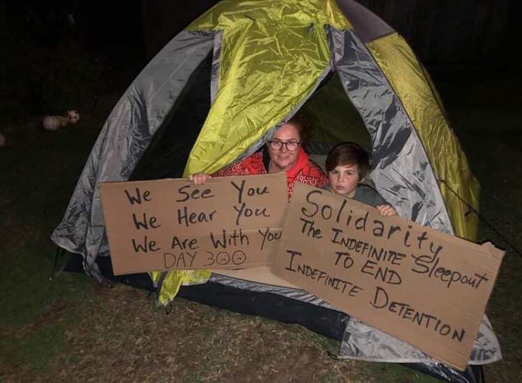 Participants in the sleepout mark 300 days.