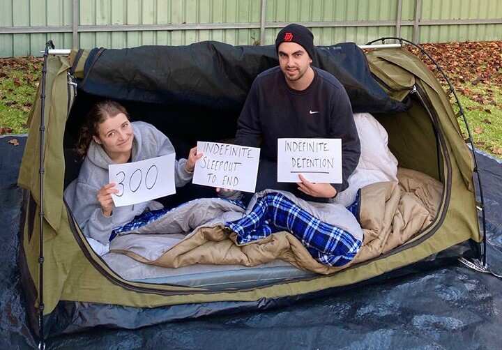 Participants in the sleepout mark 300 days