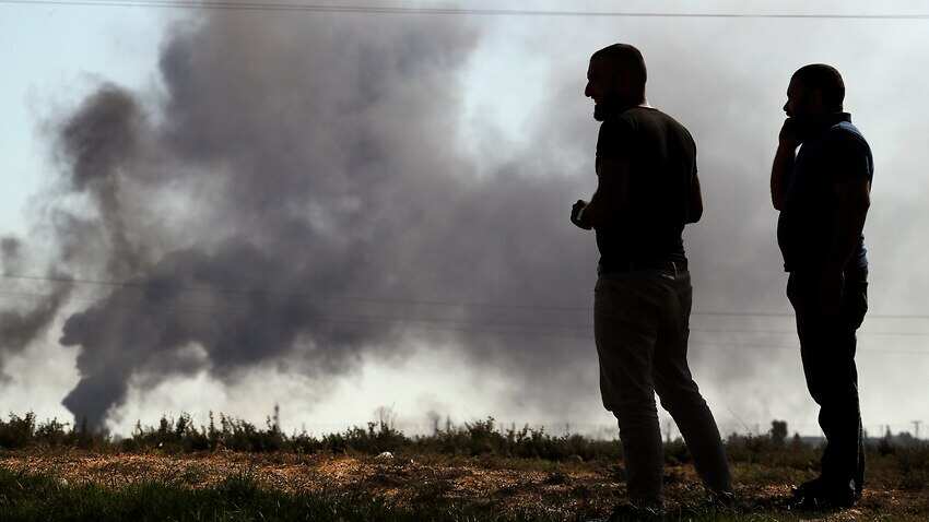 Smoke billows from targets inside Syria on 10 October. 