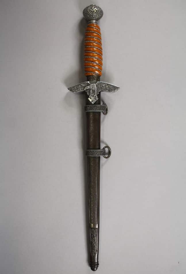 A "German Third Reich era Luftwaffe officer's dagger with scabbard".