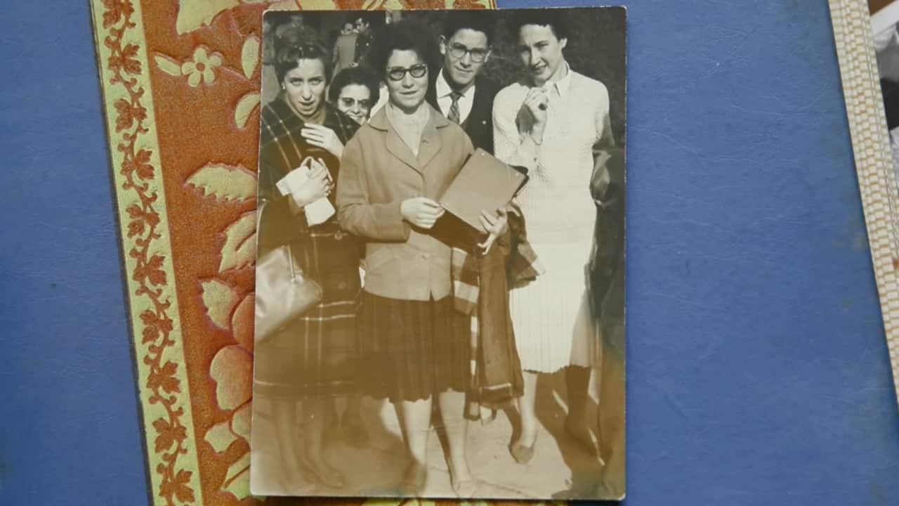 Mari Paz's family farewells her at the airport in Madrid before her three-day journey to Melbourne.