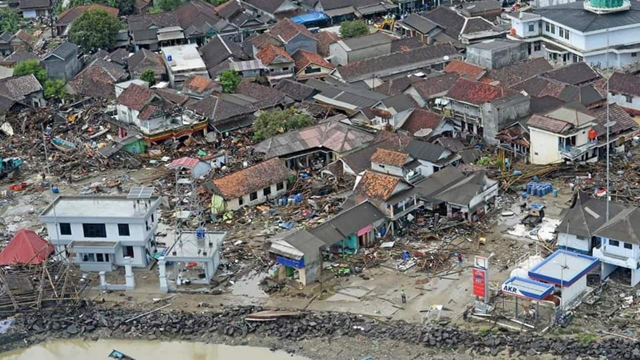 Demolished homes seen from a rescue helicopter after a tsunami hit the Sunda Strait, in Banten, Indonesia. Source: AAP