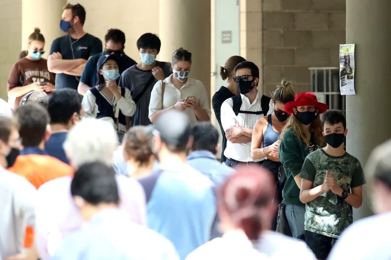 People line up at a mass vaccination hub at South Bank in Brisbane.