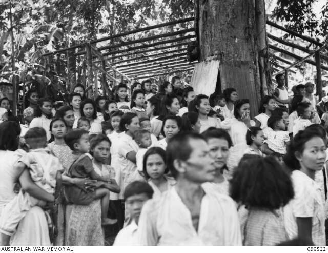 Chinese prisoners at Ratongor as Australian soldiers arrive in September 1945.